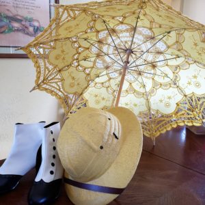 Parasol shoes and pith helmet
